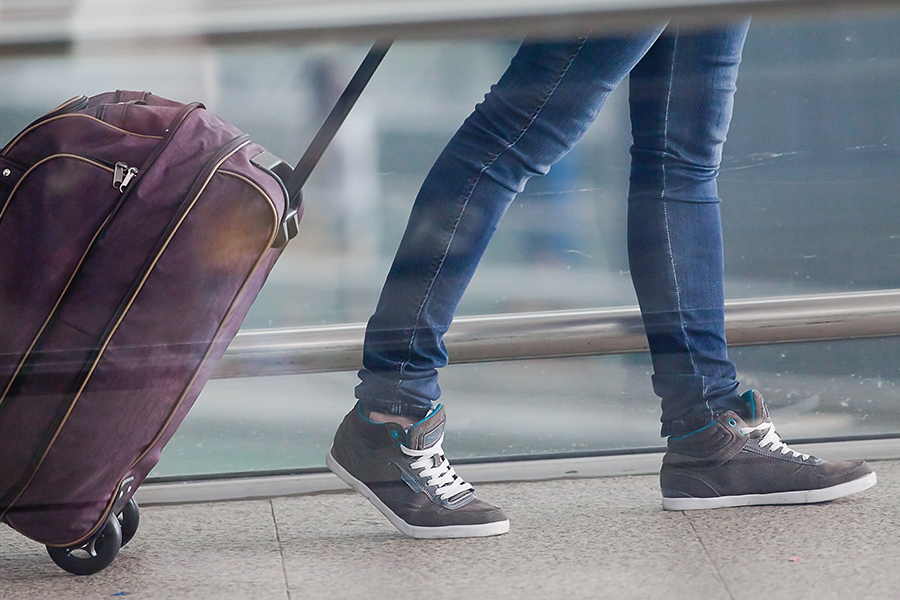 Walking with a suitcase
